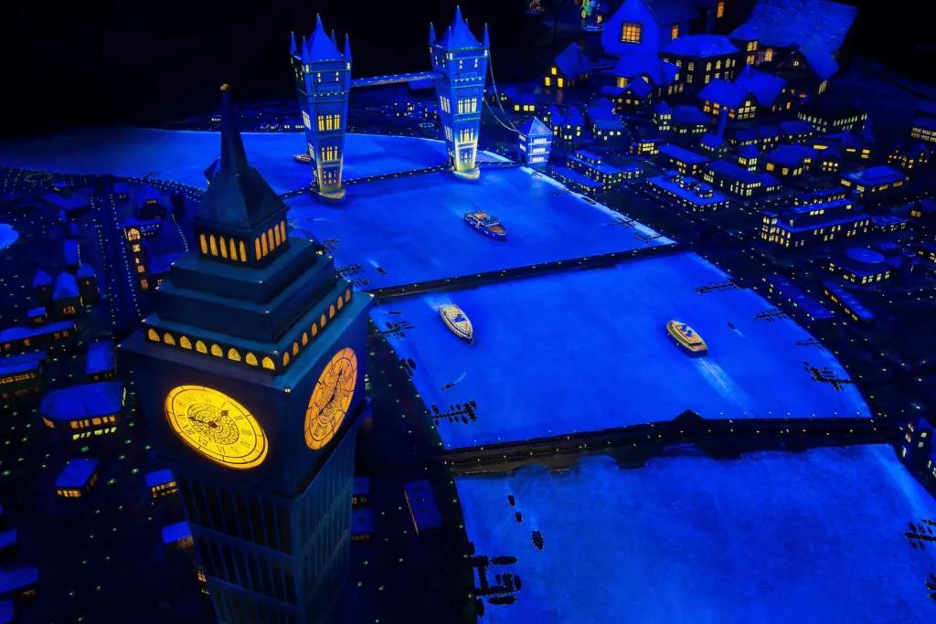 A model London at night featuring Big Ben, Tower Bridge and the Thames