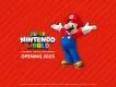 An image of Super Mario on a red background, next to the text "Super Nintendo World, Opening 2023"