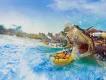 There are 6 slides ending up in a pool which end with people zooming out of an open snake's mouth statue. Everyone is sat in either a single or a double rubber ring.