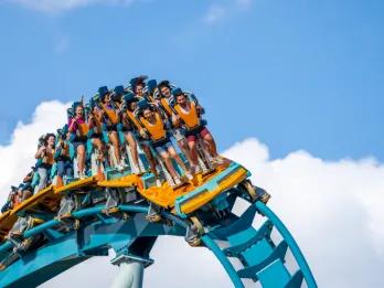 Guests riding Pipeline: The Surf Coaster at SeaWorld Orlando