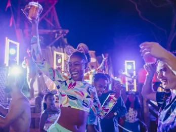 Guests dancing at Disney H2O Glow Night Party at Disney's Typhoon Lagoon
