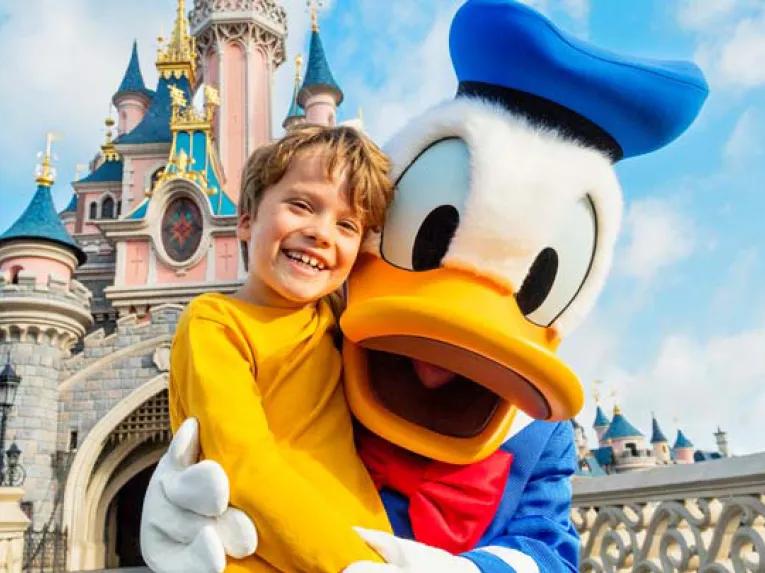 Guest with Donald Duck at Disneyland Paris