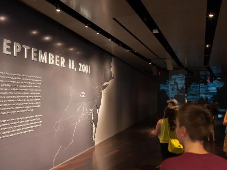 Guests exploring the September 11 exhibit at the 9/11 Memorial Museum
