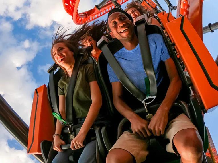 Couple riding Tigris rollercoaster at Busch Gardens Tampa Bay