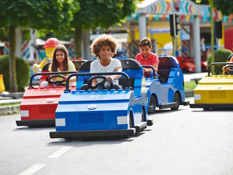 Kids enjoying LEGO driving school at LEGOLAND Windsor