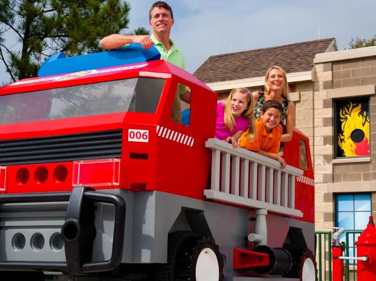Family enjoying Rescue Academy attraction at LEGOLAND Florida