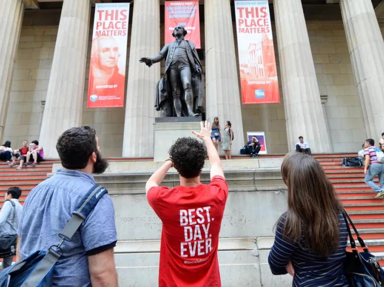 Guests on a tour of Alexander Hamilton sights in New York City
