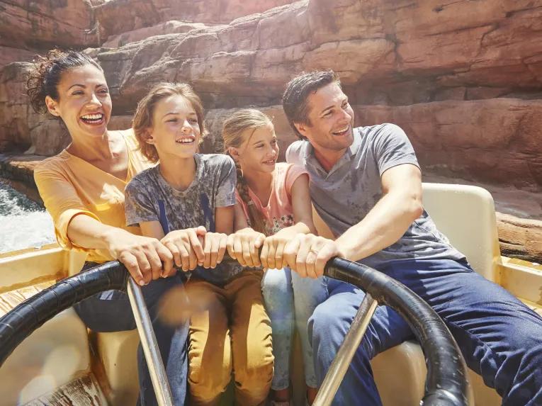 Guests riding Gran Canyon Rapids at PortAventura theme park