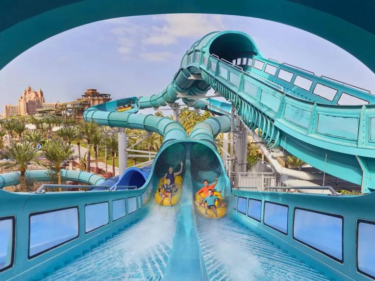 Guests riding Medusa's Lair water slide at Aquaventure Dubai