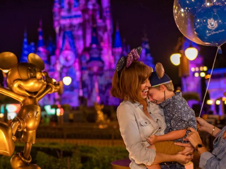Guests enjoying Magic Kingdom after dark