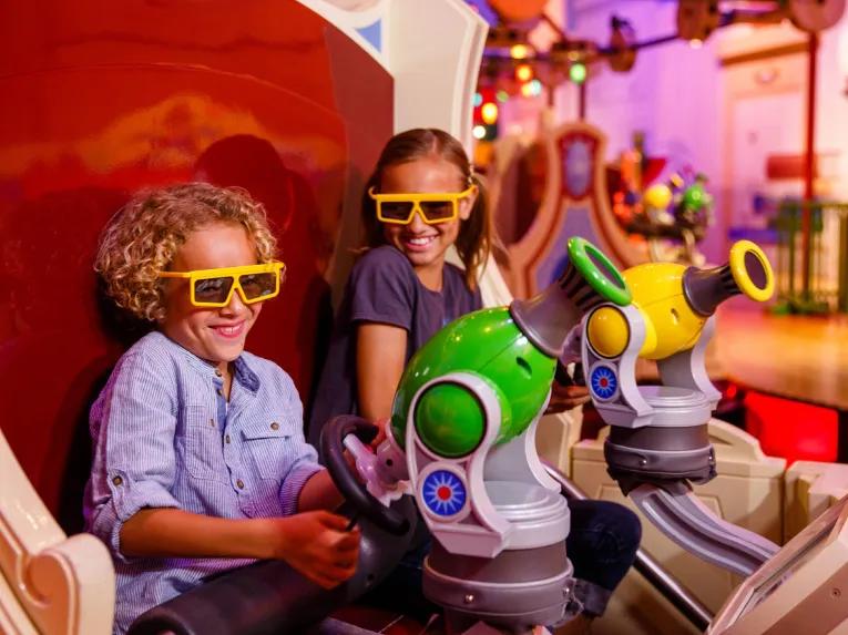 Guests on Toy Story Midway Mania at Disney California Adventure Park
