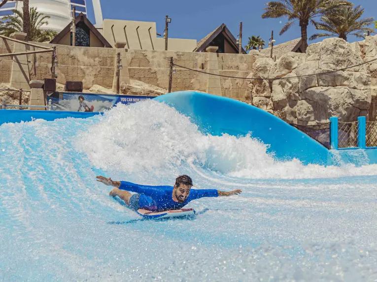 Man on Wipeout & Riptide Flowrider, Wild Wadi Waterpark in Dubai