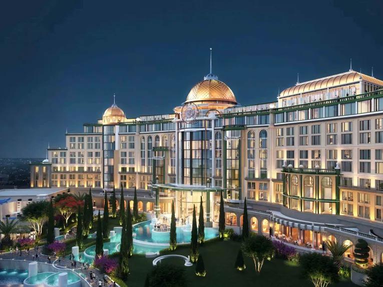 Park side exterior of Universal Helios Grand Hotel at night