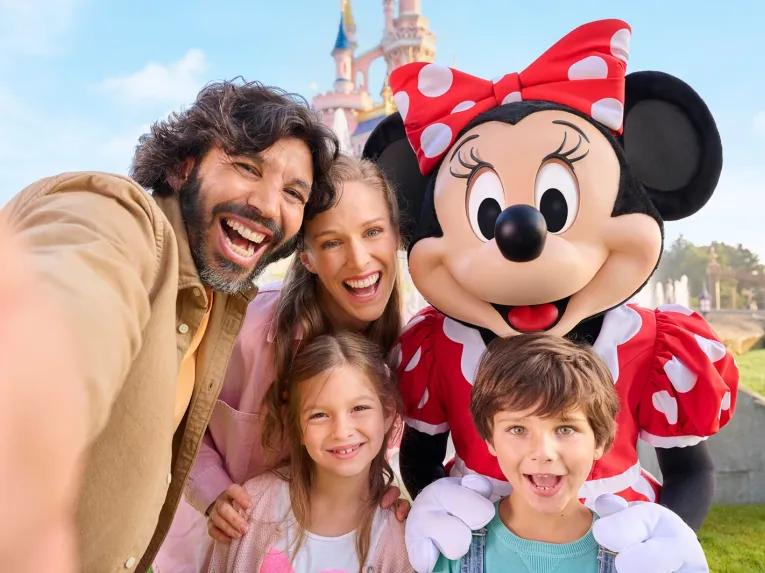 Guests with Minnie Mouse, Disneyland® Park